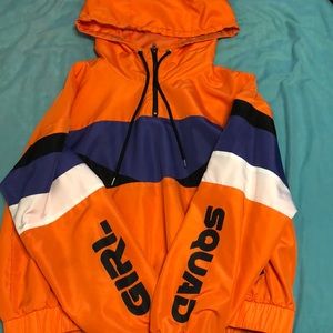 orange windbreaker